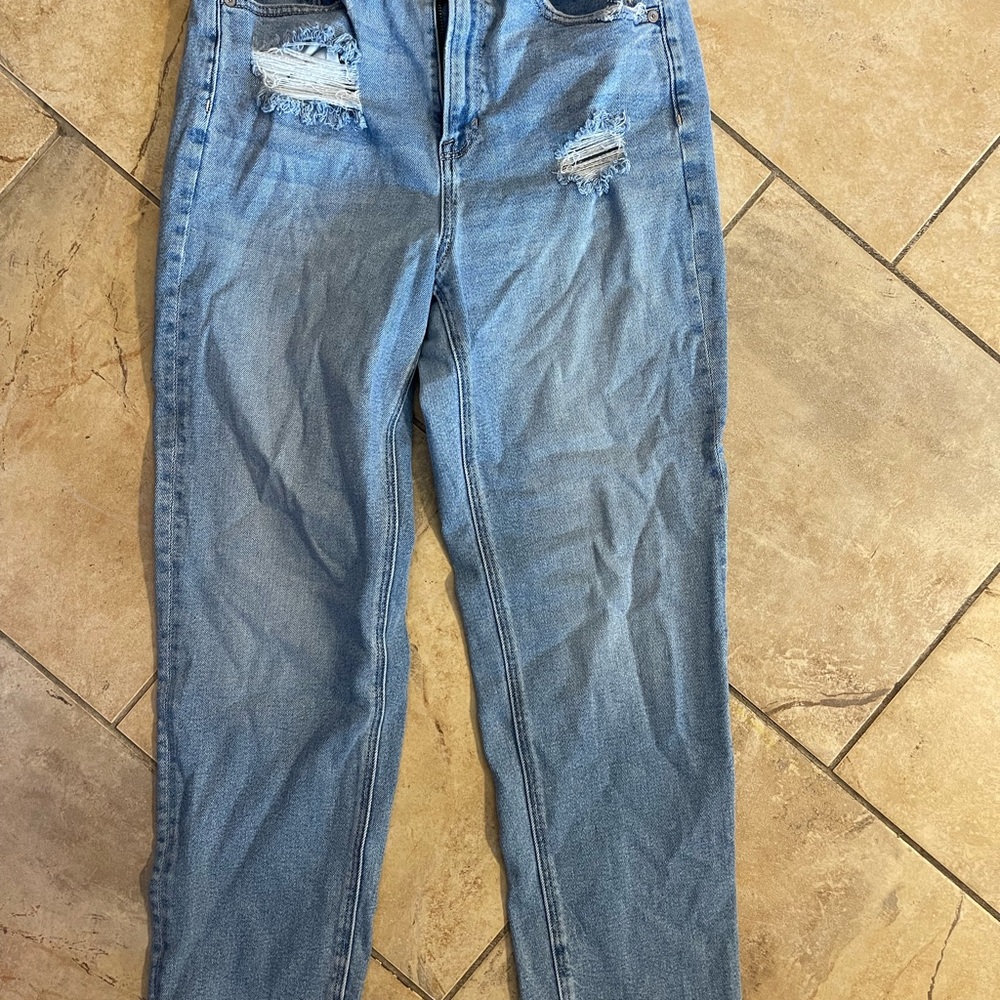 Distressed Blue Denim Jeans